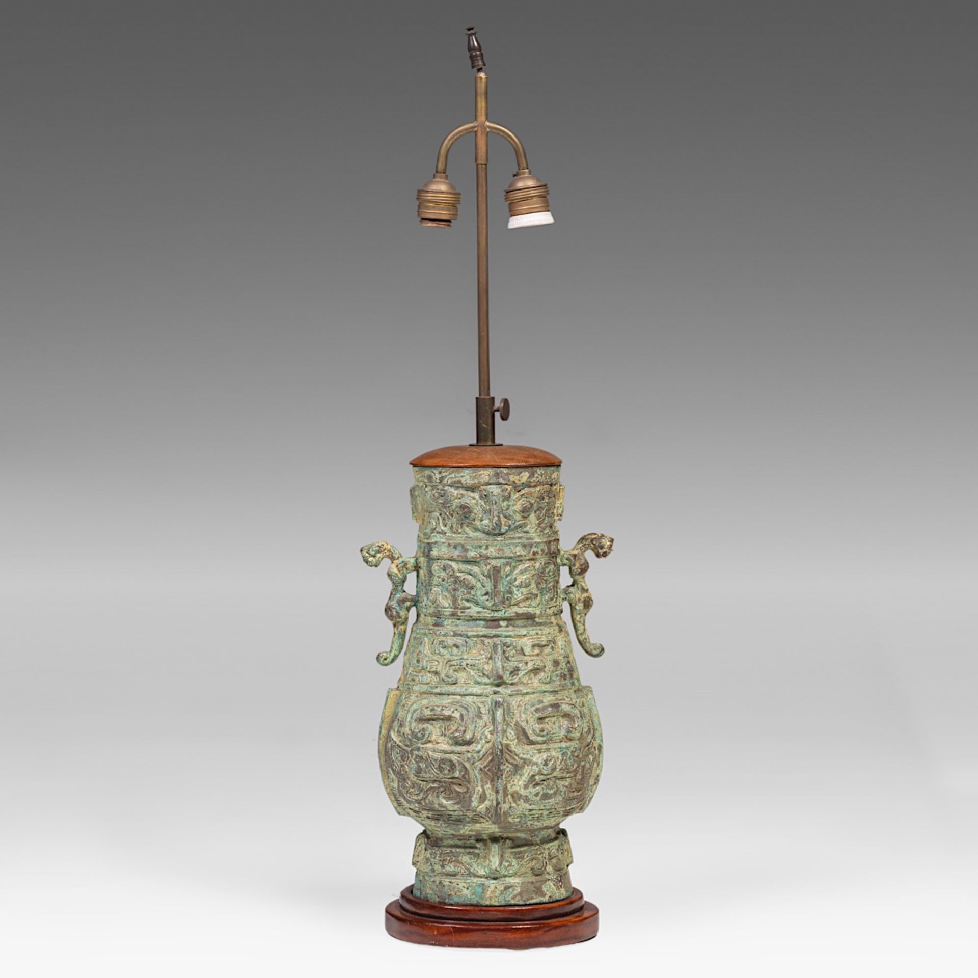 A Chinese archaistic bronze vase, fixed with lamp mounts, total H 75 cm