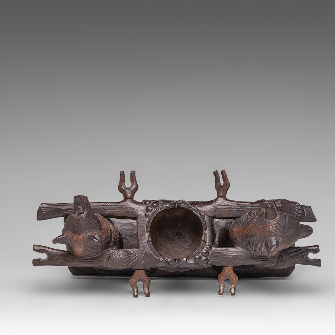 A Black Forest carved wooden liquor stand with two bears carrying the decanter and six glasses, H 4 - Image 8 of 10