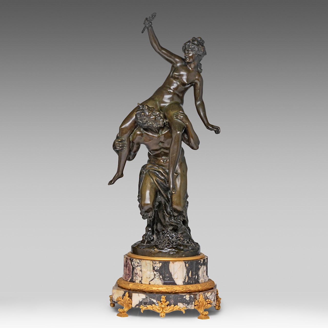 Clodion (1738-1814), Satyr and Nymph, patinated bronze on a marble base with gilt bronze mounts, H 6