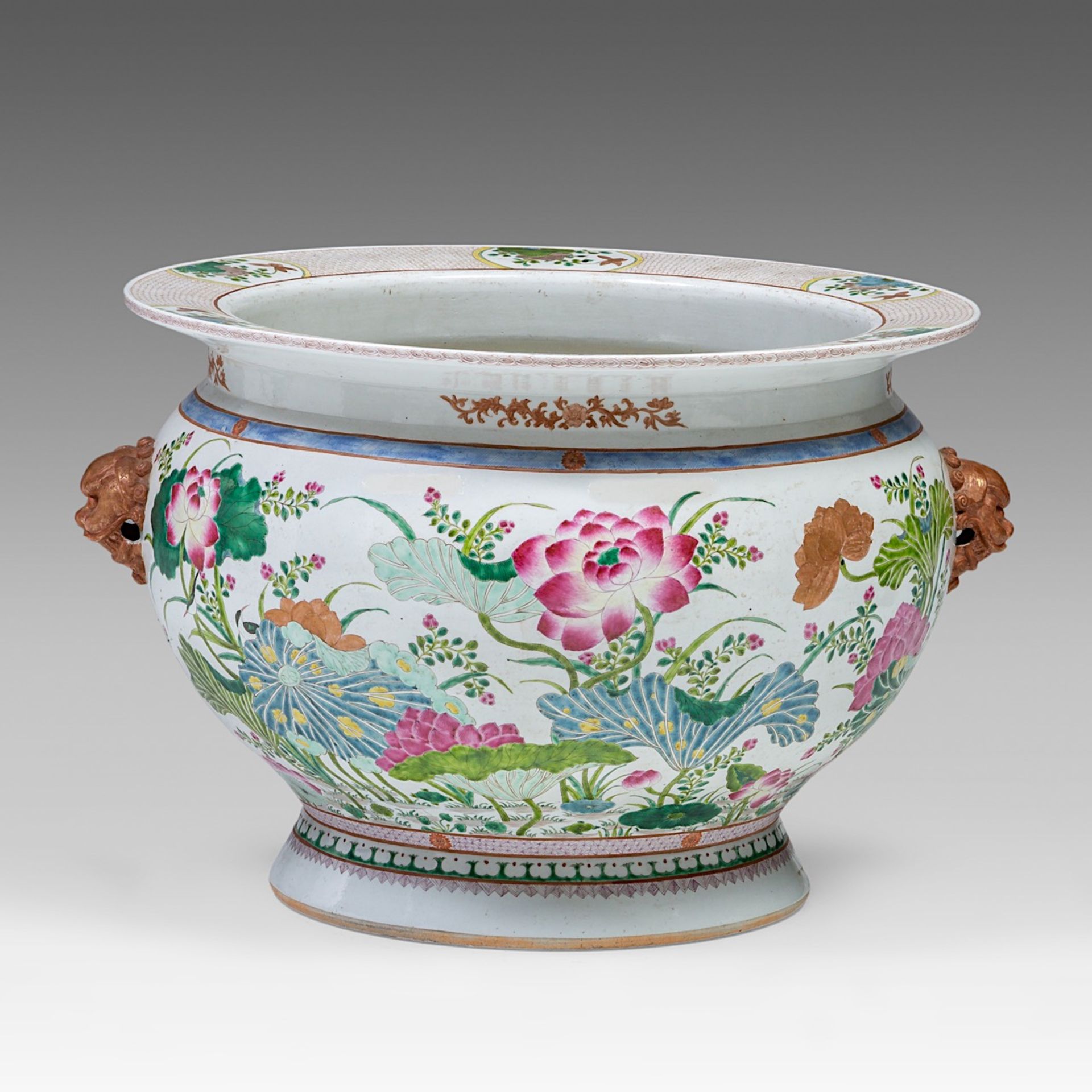 A French Samson famille rose 'Lotus Pond' fish bowl, paired with lion handles, 19thC, H 42,5 - dia 5