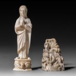 Two carved ivory Indo-Portuguese religious figures; one depicts an upright standing and praying Virg