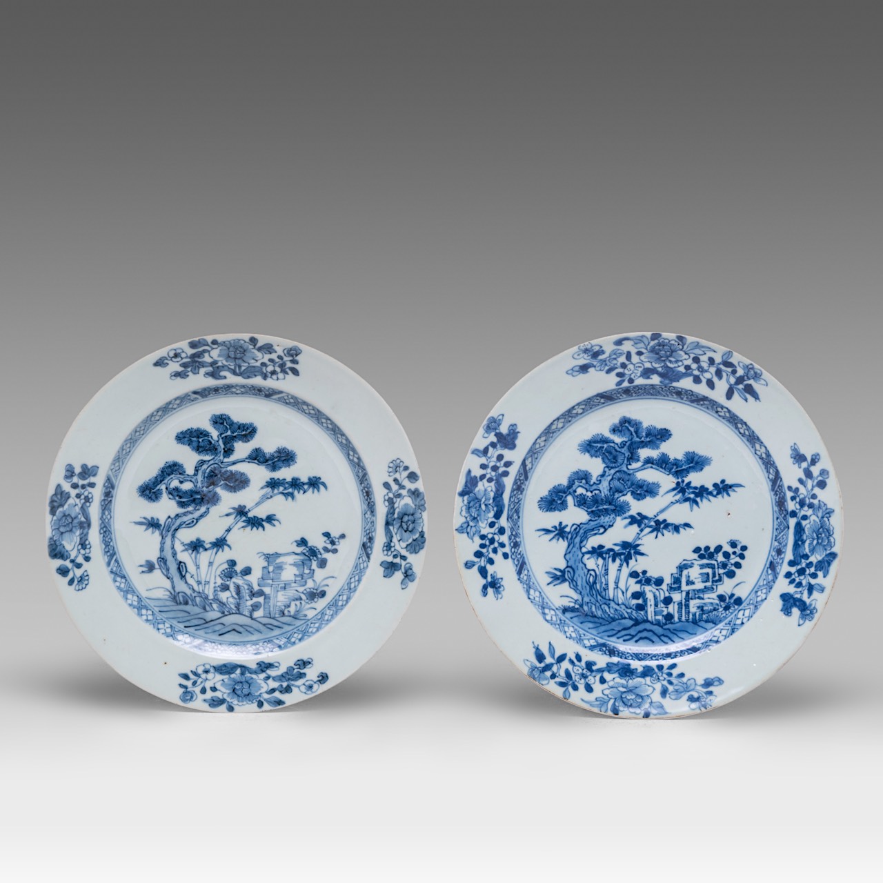 A series of four Chinese blue and white 'Bamboo below Pine' dishes and plates, 18thC, dia 22,5 - 28, - Image 8 of 12