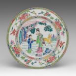 A Chinese famille rose 'Female Immortal and Deer' plate, 18thC, dia 32 cm