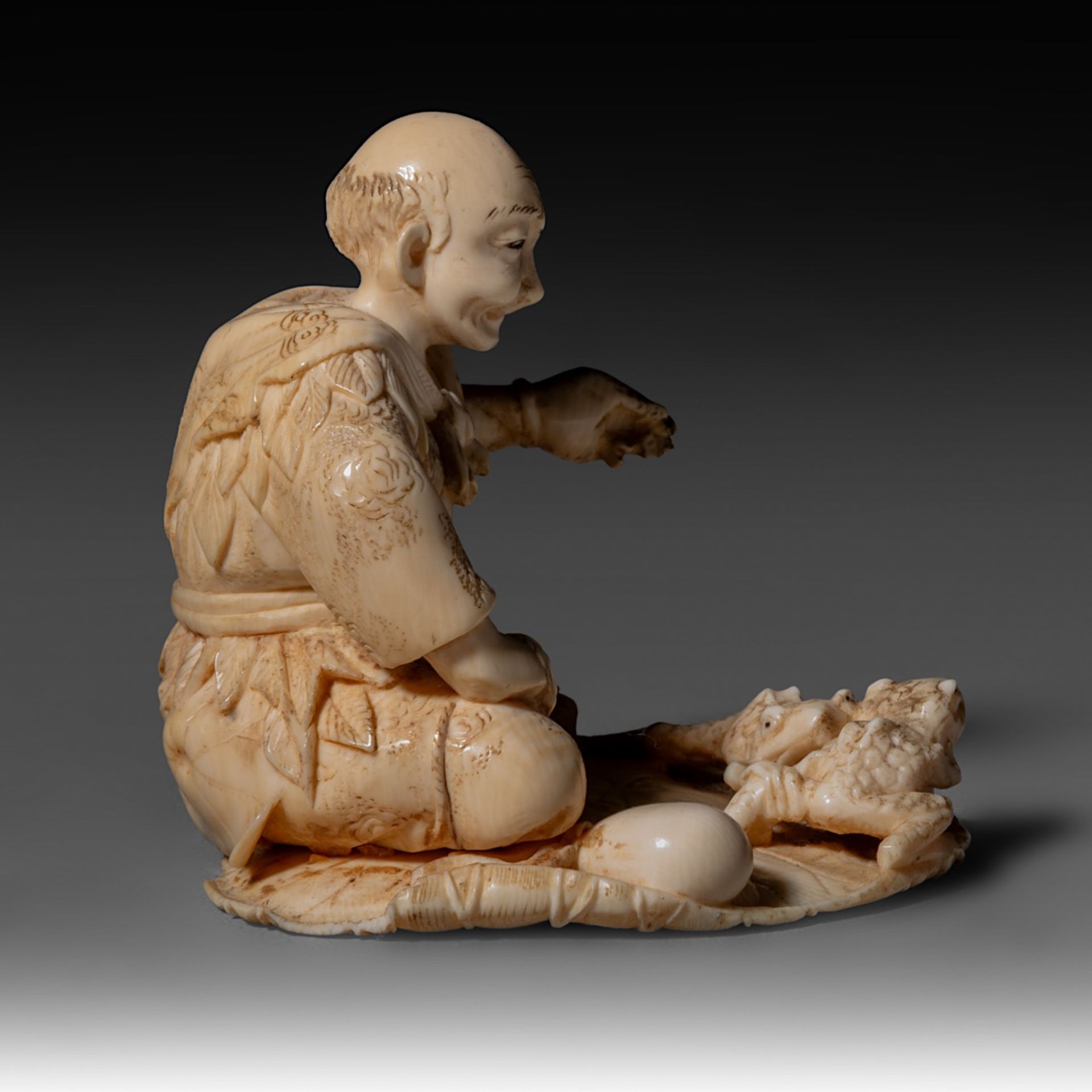 Two Japanese Meiji-period (1868-1912) ivory okimono; one depicts a man rowing a raft while a child s - Image 17 of 19