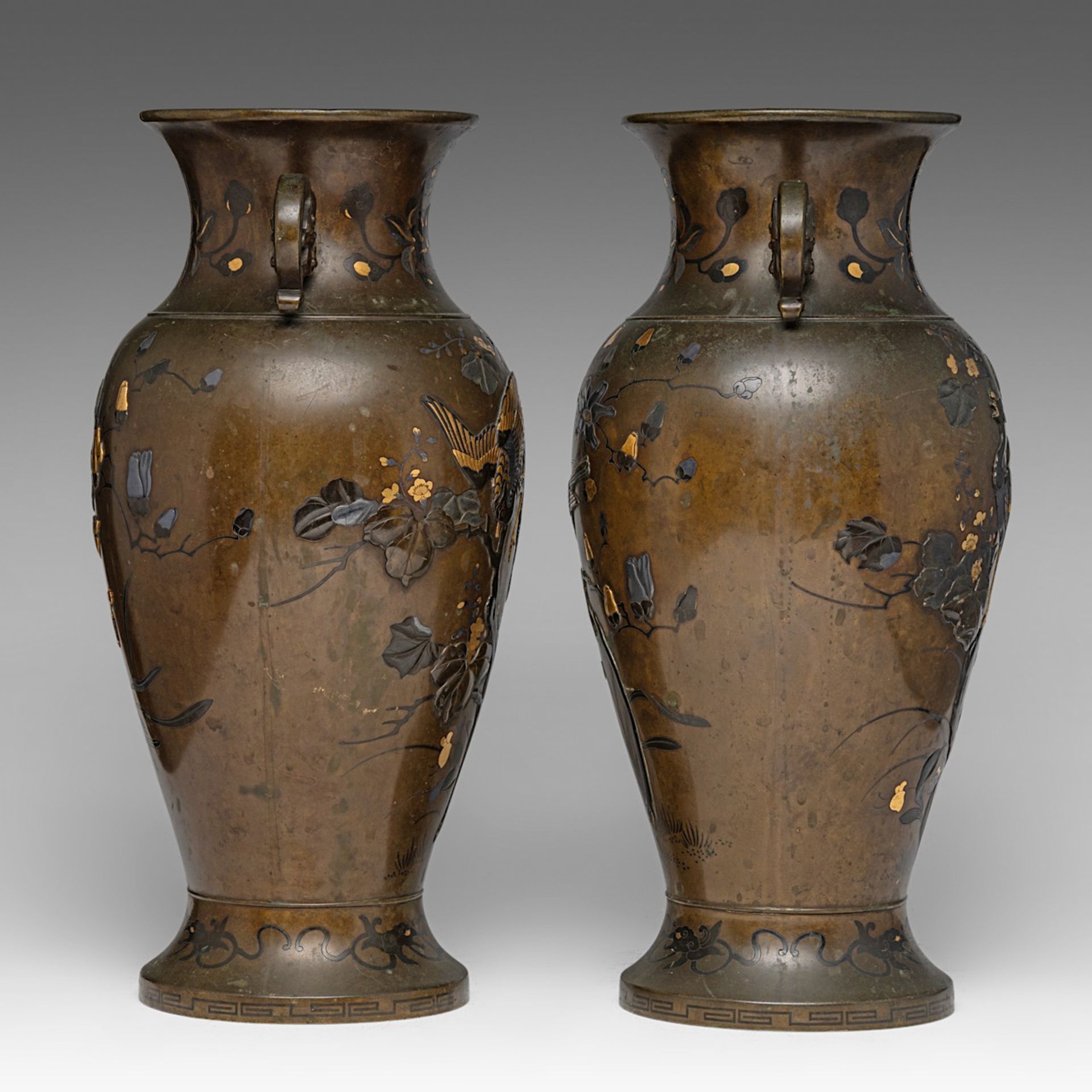 A pair of Japanese bronze 'Phoenix' vases with gilt details, Meiji period (1868-1912), both H 41,5 c - Image 4 of 6