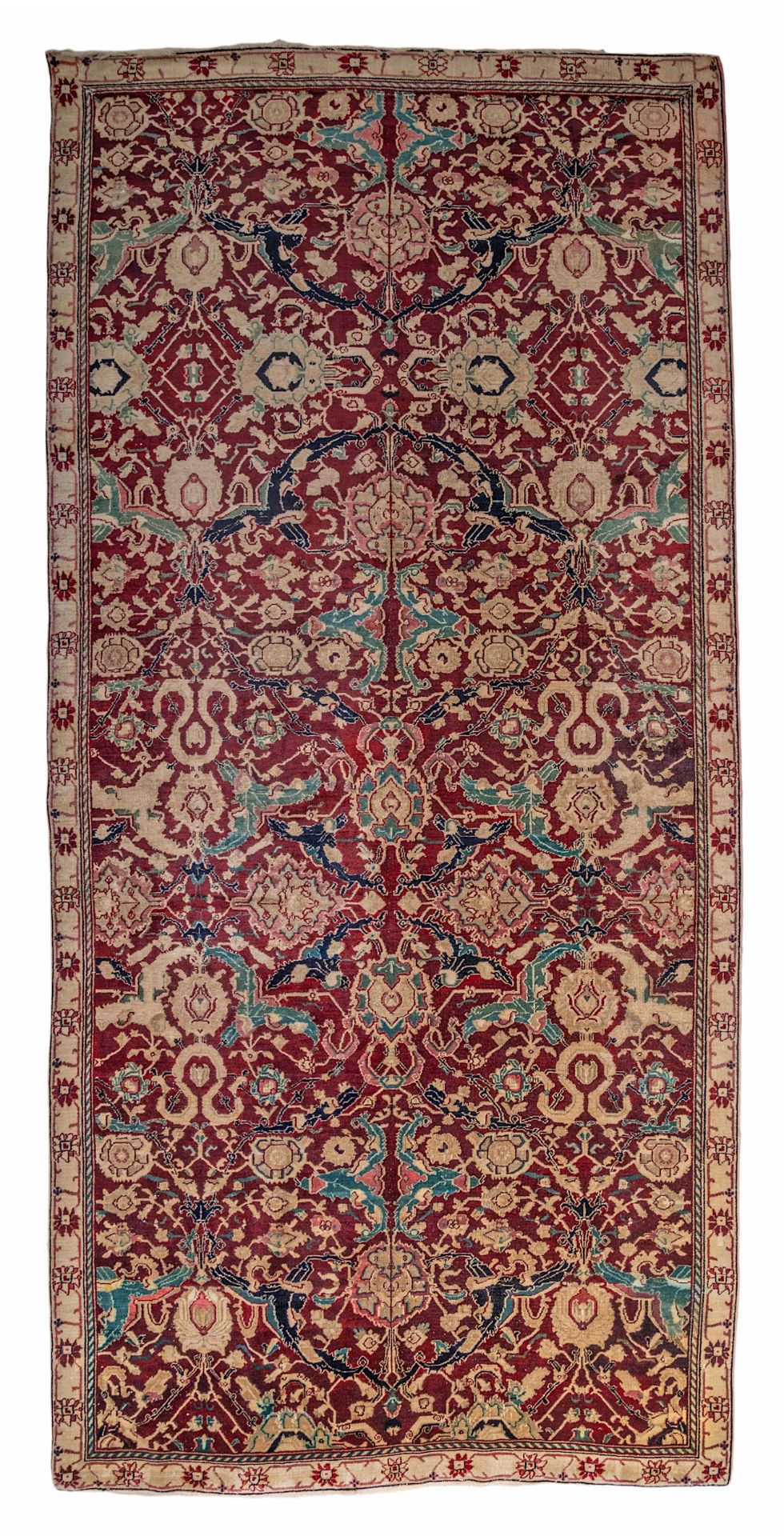 An Oriental rug, floral decorated, 187 x 398 cm