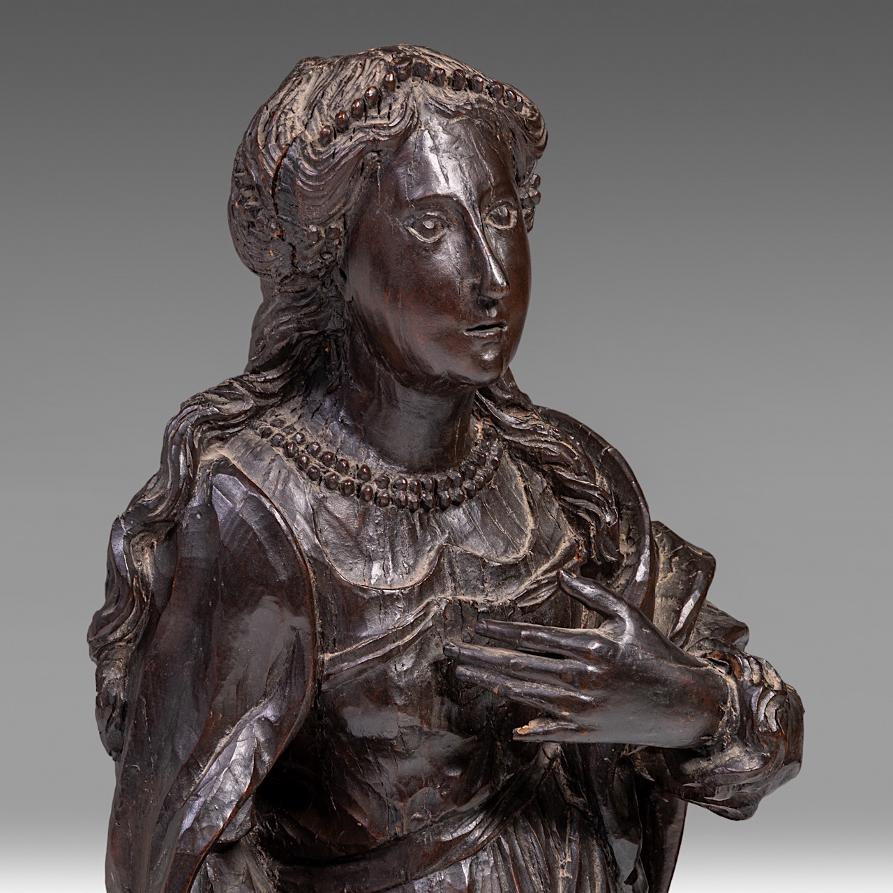 A carved wooden sculpture of Saint Barbara, on a matching console, H 139 cm (total) - Image 9 of 10