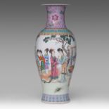 A Chinese famille rose 'Court Ladies in a Garden' baluster vase, the back with a signed text, 20thC,