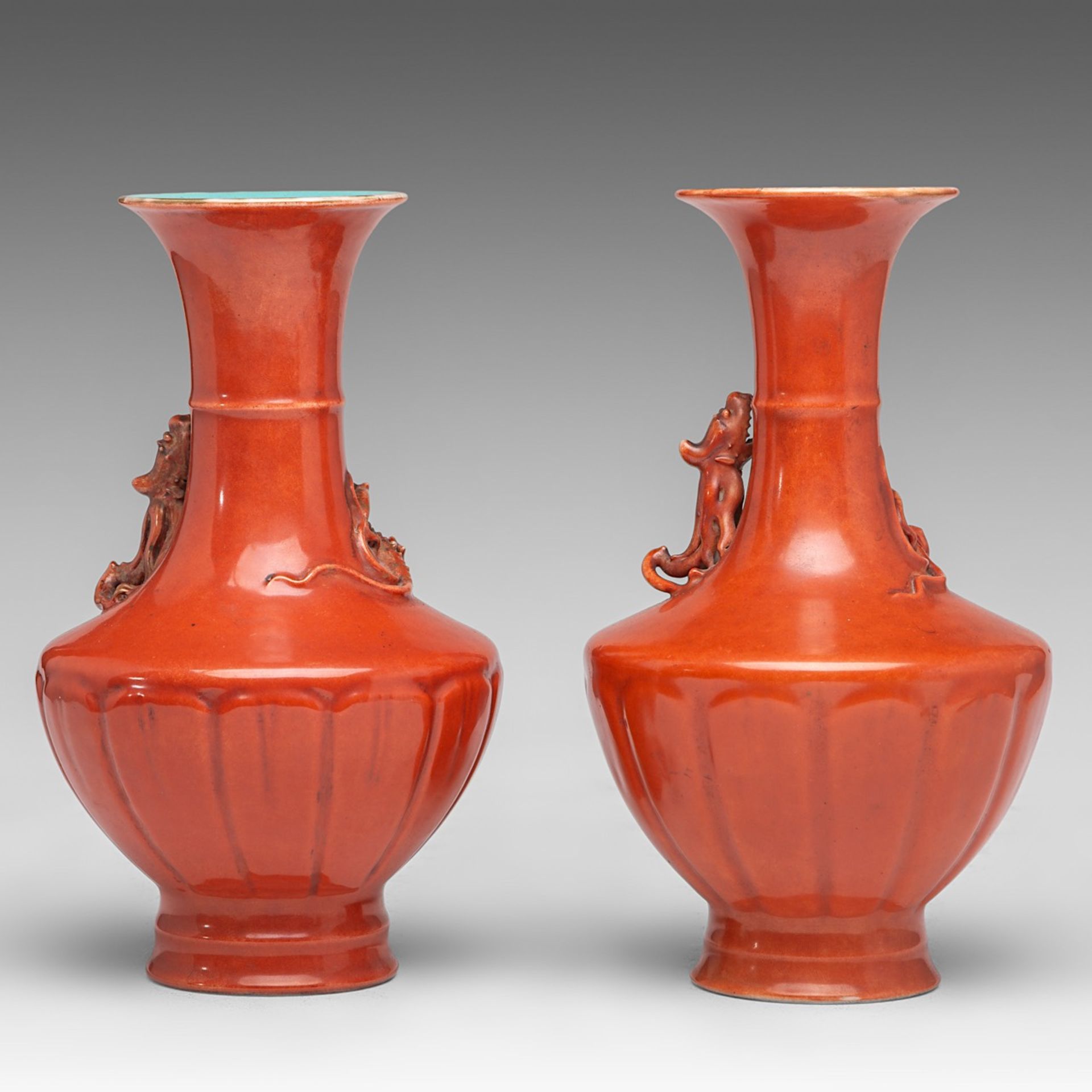 A similar pair of Chinese coral-red ground 'Dragon' vases, with a Qianlong mark, 19thC, H 19 - 19,5 - Bild 3 aus 6
