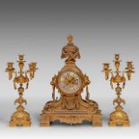 A three-piece Neoclassical gilt bronze mantle clock, H 50 - 65 cm