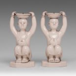 A pair of Chinese Dehua blanc-de-Chine Hehe erxian boys candle sticks, Republic period/20thC, H 13,8