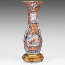 A large Japanese Imari vase, fixed on a gilt bronze foot and with a ditto rim, late Meiji (1868-1912