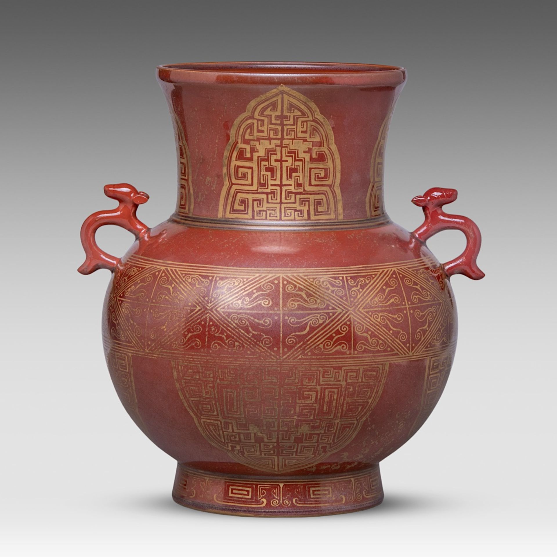 A Chinese archaistic gilt on red ground hu vase, paired with deer handles, with a Jing Wei Tang Zhi