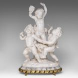 A charming alabaster group of playing putti, on a gilt brass stand, H 68 cm (total)