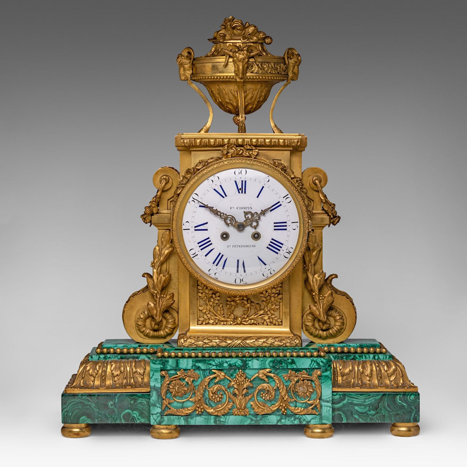 An imposing Neoclassical malachite and gilt bronze mantle clock, Chopin Felix factory, Saint Petersb