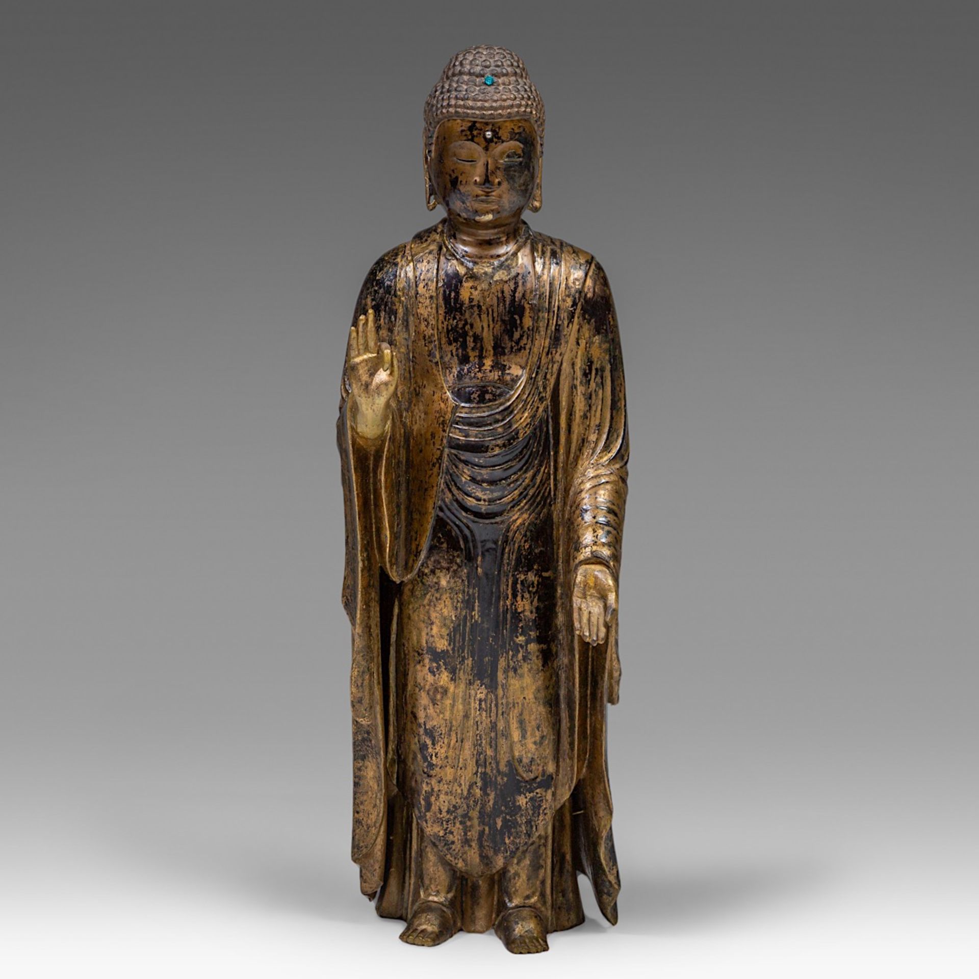 An imposing Japanese gilt lacquered standing Buddha Shakyamuni, Meiji period, H 101 cm