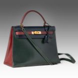 A vintage Hermes 'Kelly' 32 handbag, in rouge vif/vert fonce/bleu indigo box calfskin, with gilt met