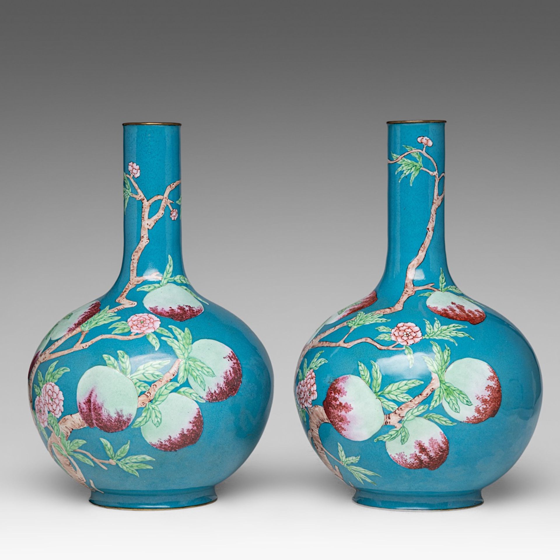A fine pair of Chinese turquoise ground Canton enamel on copper 'Nine Peaches' bottle vases, late Qi - Image 2 of 6