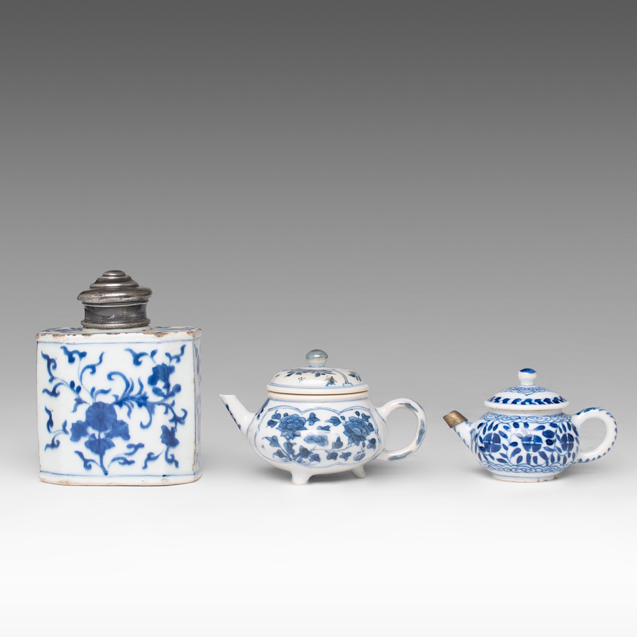 A small collection of three Chinese blue and white floral decorated tea ware, Kangxi period and 18th