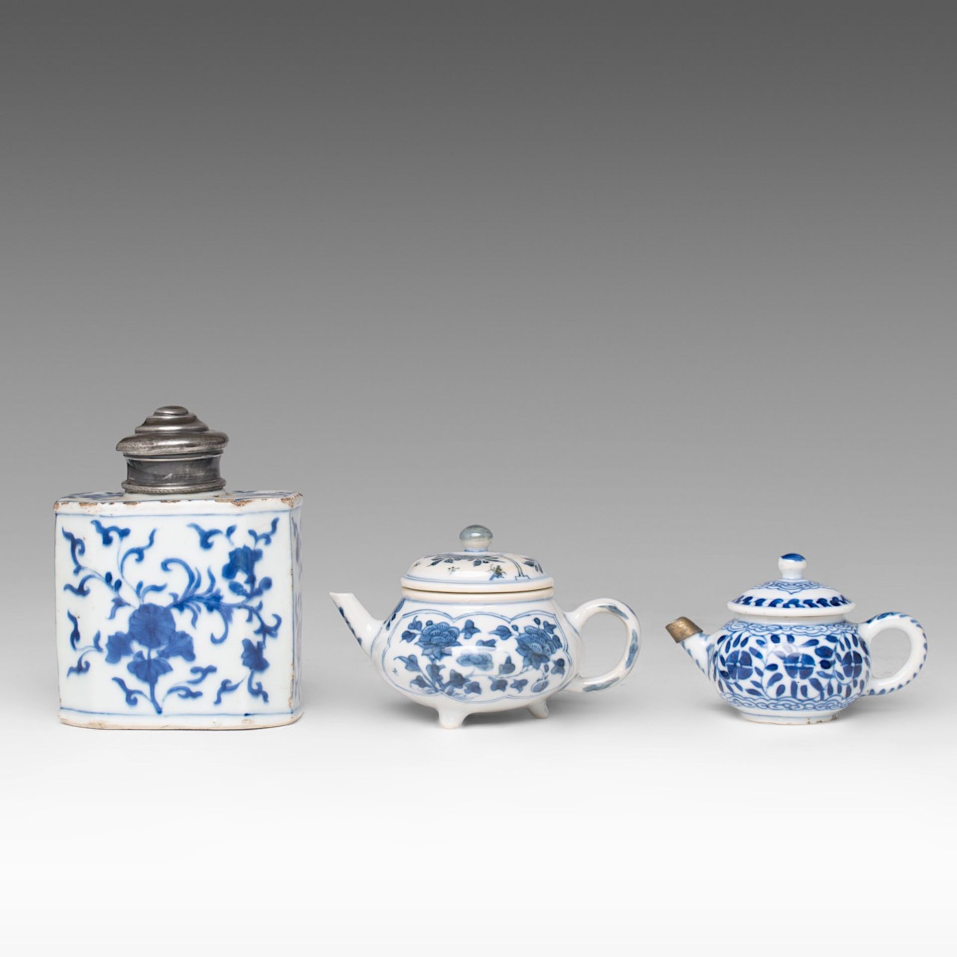 A small collection of three Chinese blue and white floral decorated tea ware, Kangxi period and 18th