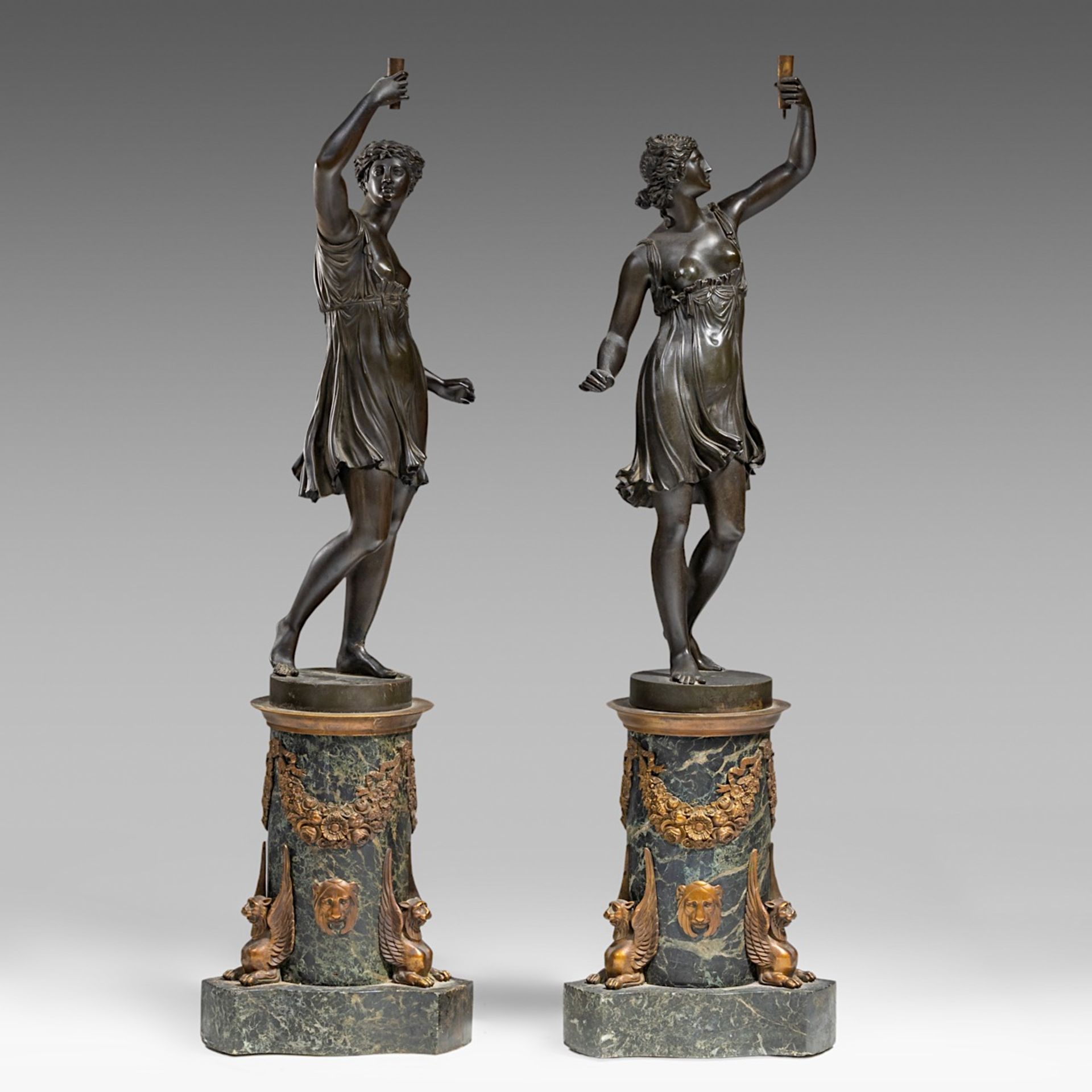 A pair of Empire style patinated bronze and vert de mer marble figural sculptures, H 86 cm