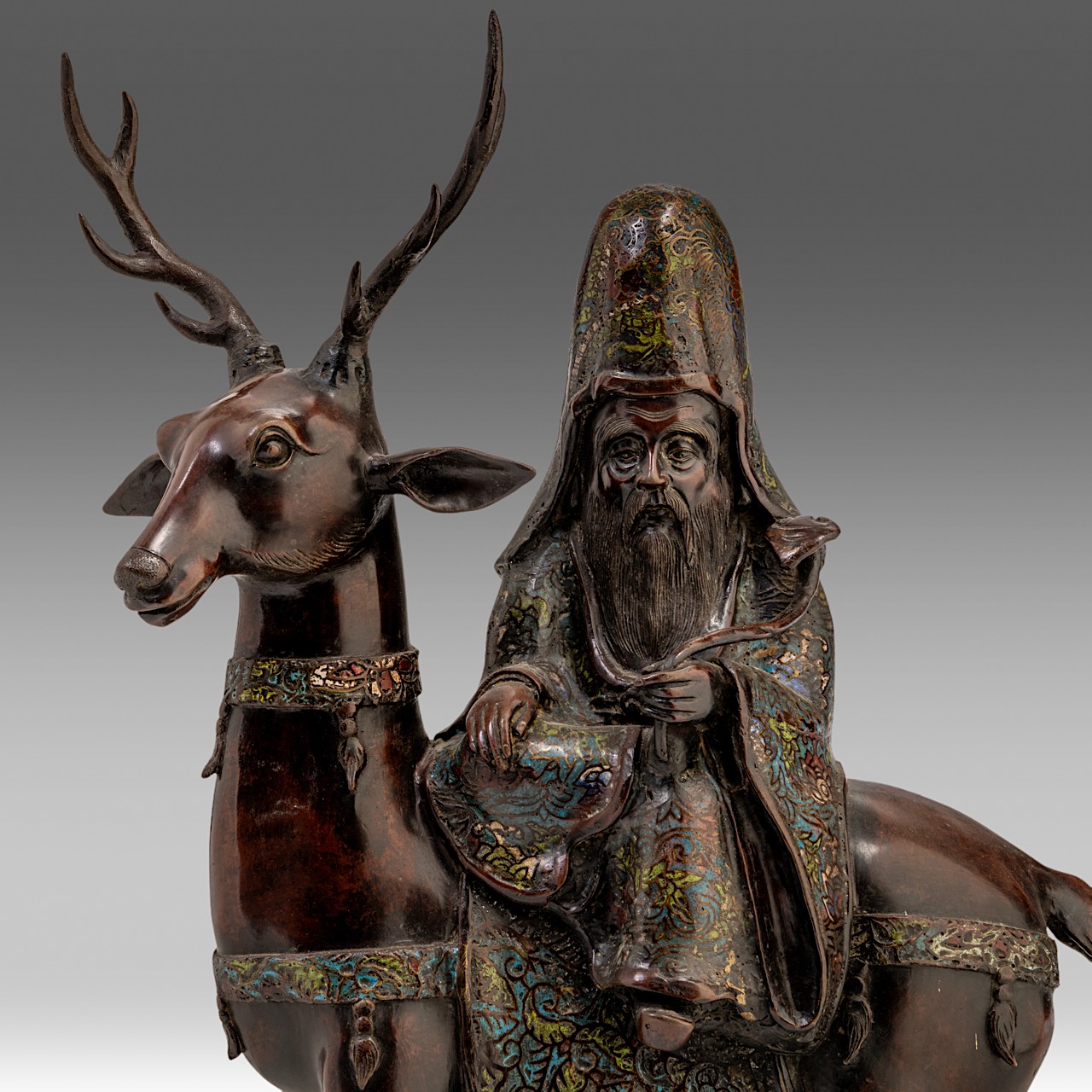 A Japanese champleve enamelled bronze statue of Fukurokuju riding a deer, late Meiji (1868-1912), H - Image 8 of 9