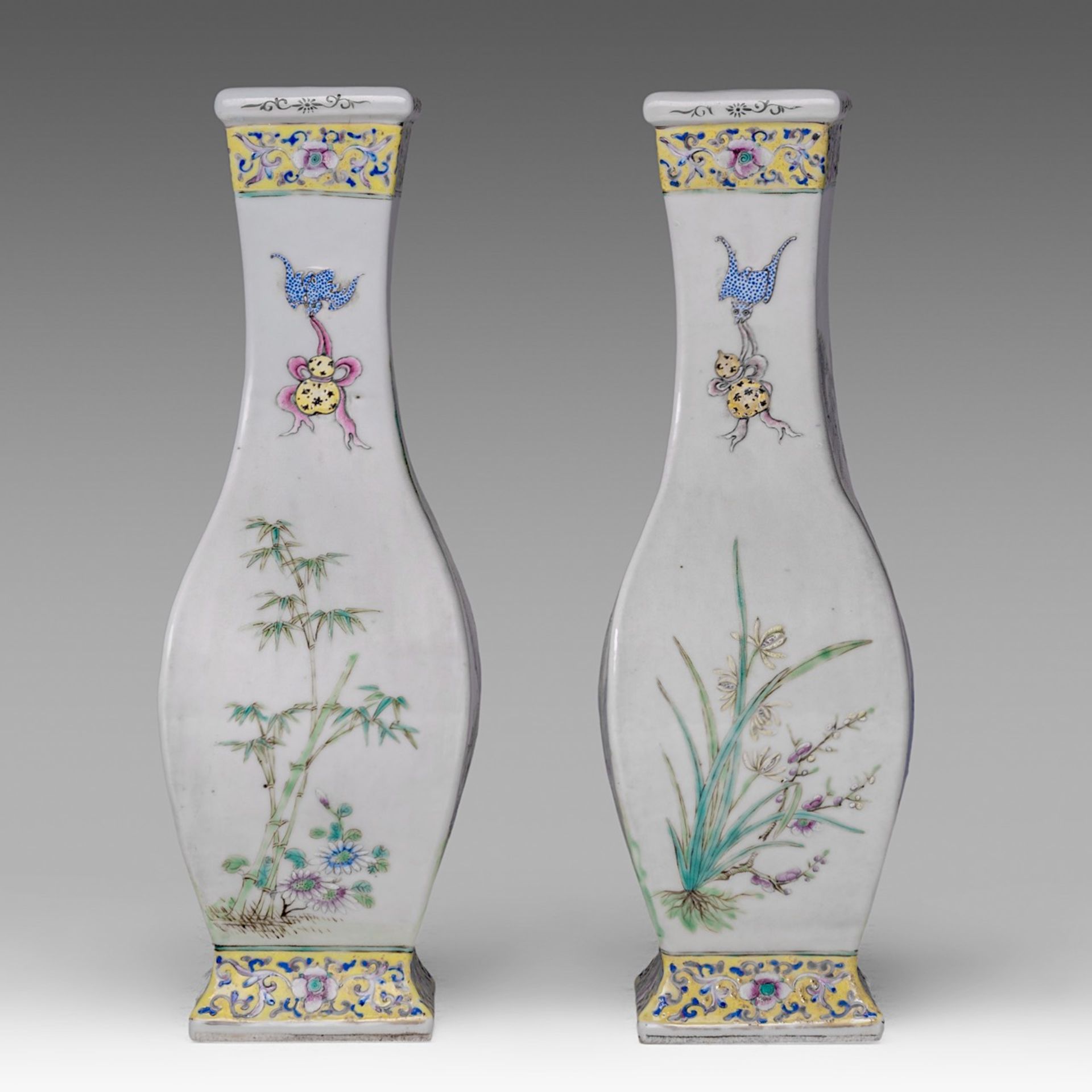 A pair of Chinese famille rose 'Scholar and Pupil boy' fanghu vases, with a Qianlong mark, Republic - Image 2 of 6