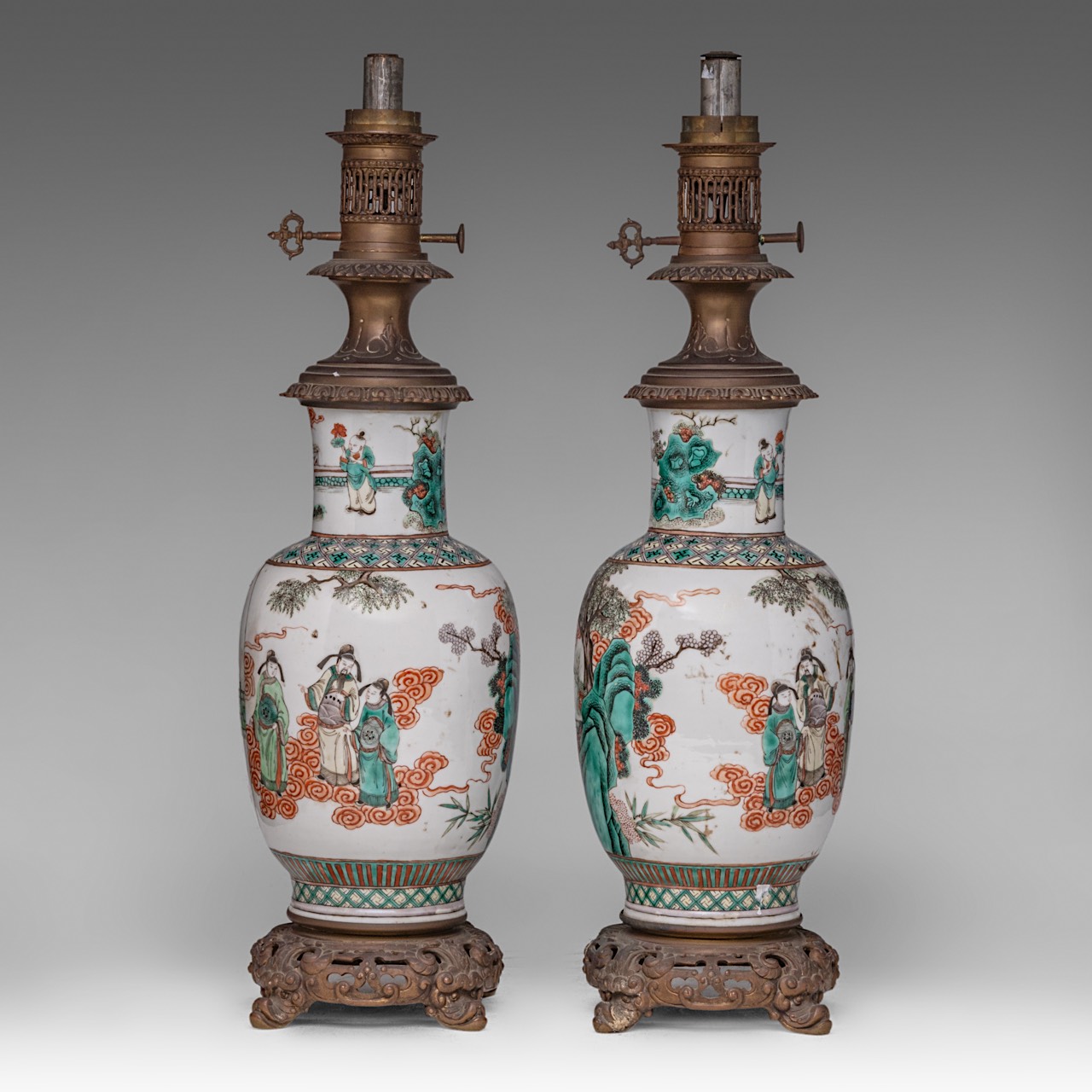 A pair of Chinese famille verte 'Immortals in a Garden' vases, fixed with lamp mounts, late 19thC, T - Image 3 of 5