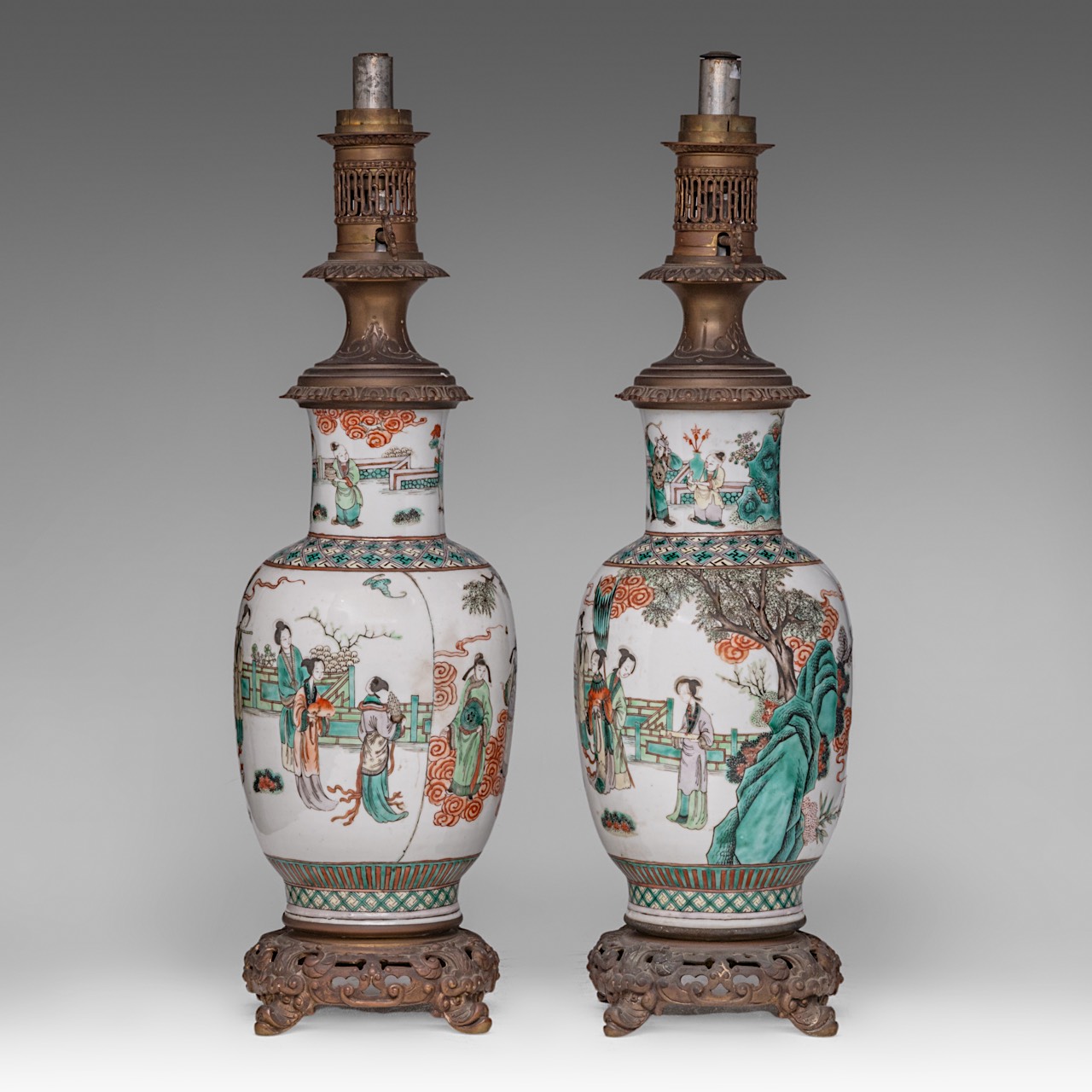 A pair of Chinese famille verte 'Immortals in a Garden' vases, fixed with lamp mounts, late 19thC, T - Image 2 of 5