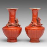 A similar pair of Chinese coral-red ground 'Dragon' vases, with a Qianlong mark, 19thC, H 19 - 19,5