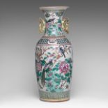 A Chinese famille rose 'Pheasants in a Garden' vase, 19thC, H 60 cm