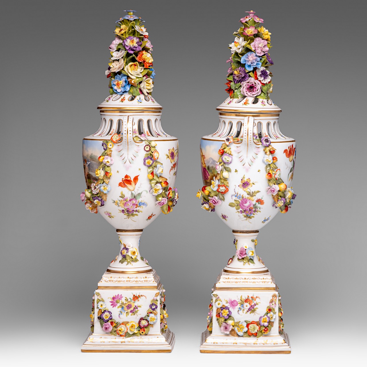 A pair of Saxony porcelain urns, with hand-painted roundels and flower relief decoration, marked Aug - Image 2 of 14