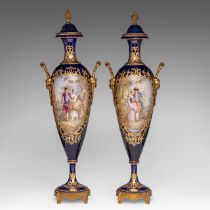 An pair of Sevres vases, with gallant scenes and gilt brass mounts, H 65 cm