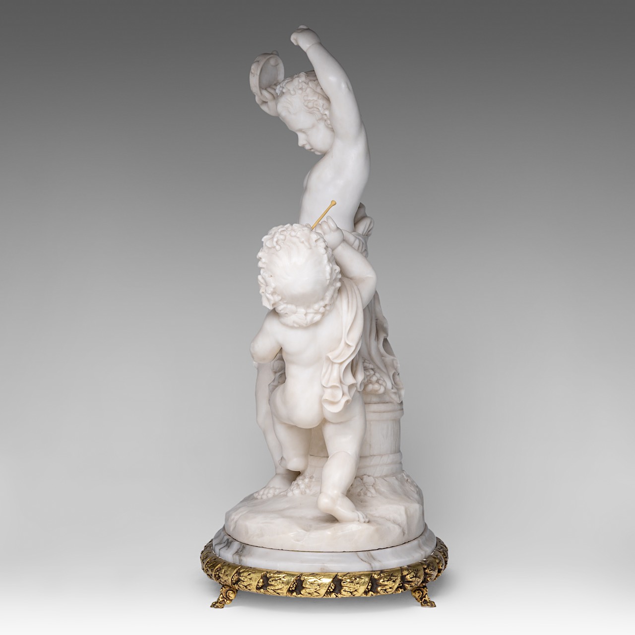 A charming alabaster group of playing putti, on a gilt brass stand, H 68 cm (total) - Image 3 of 9