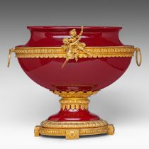 A Neoclassical 'sang de boeuf' glazed porcelain plant stand with gilt bronze mounts, H 37 - W 40 cm