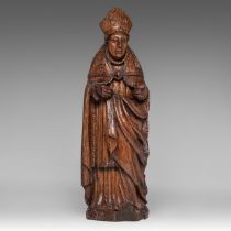 An oak sculpture of a bishop, 16th/17thC, H 52 cm
