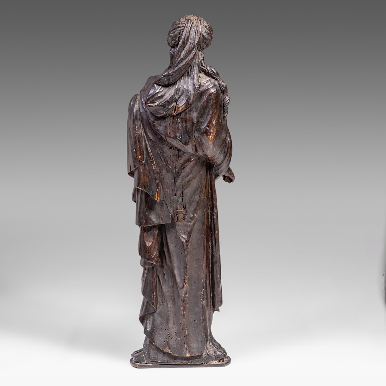 A carved wooden sculpture of Saint Barbara, on a matching console, H 139 cm (total) - Image 7 of 10
