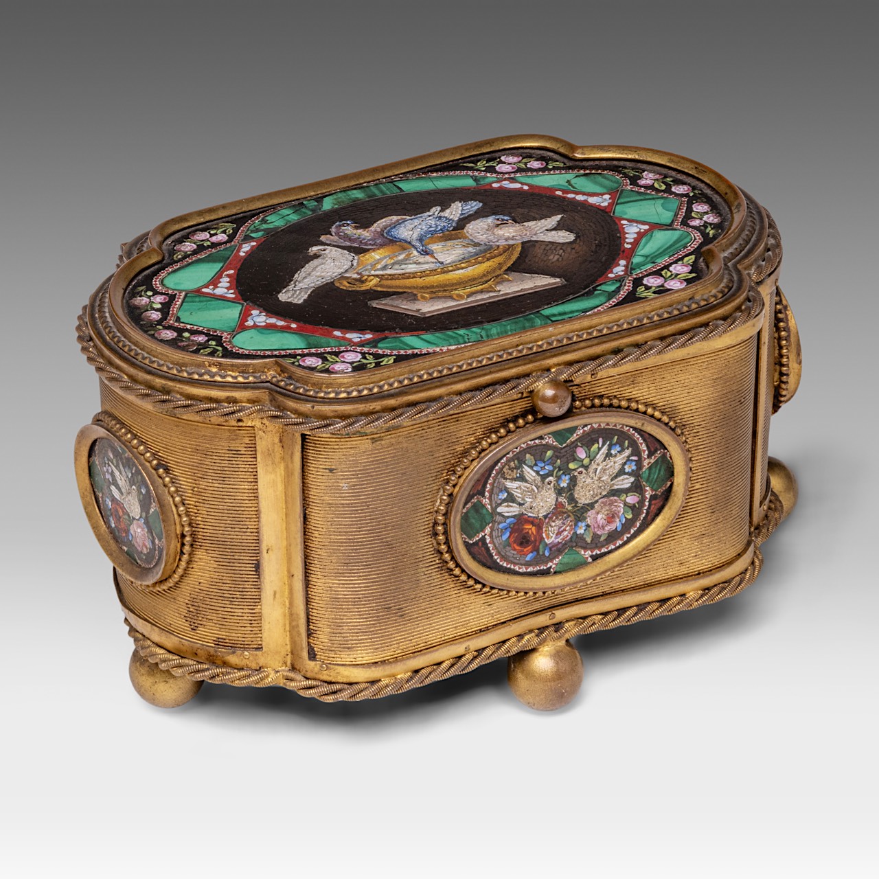 A Grand Tour Italian gilt metal and micro-mosaic jewellery casket, marked Guttin 7.5 x 14 x 9 cm. (2