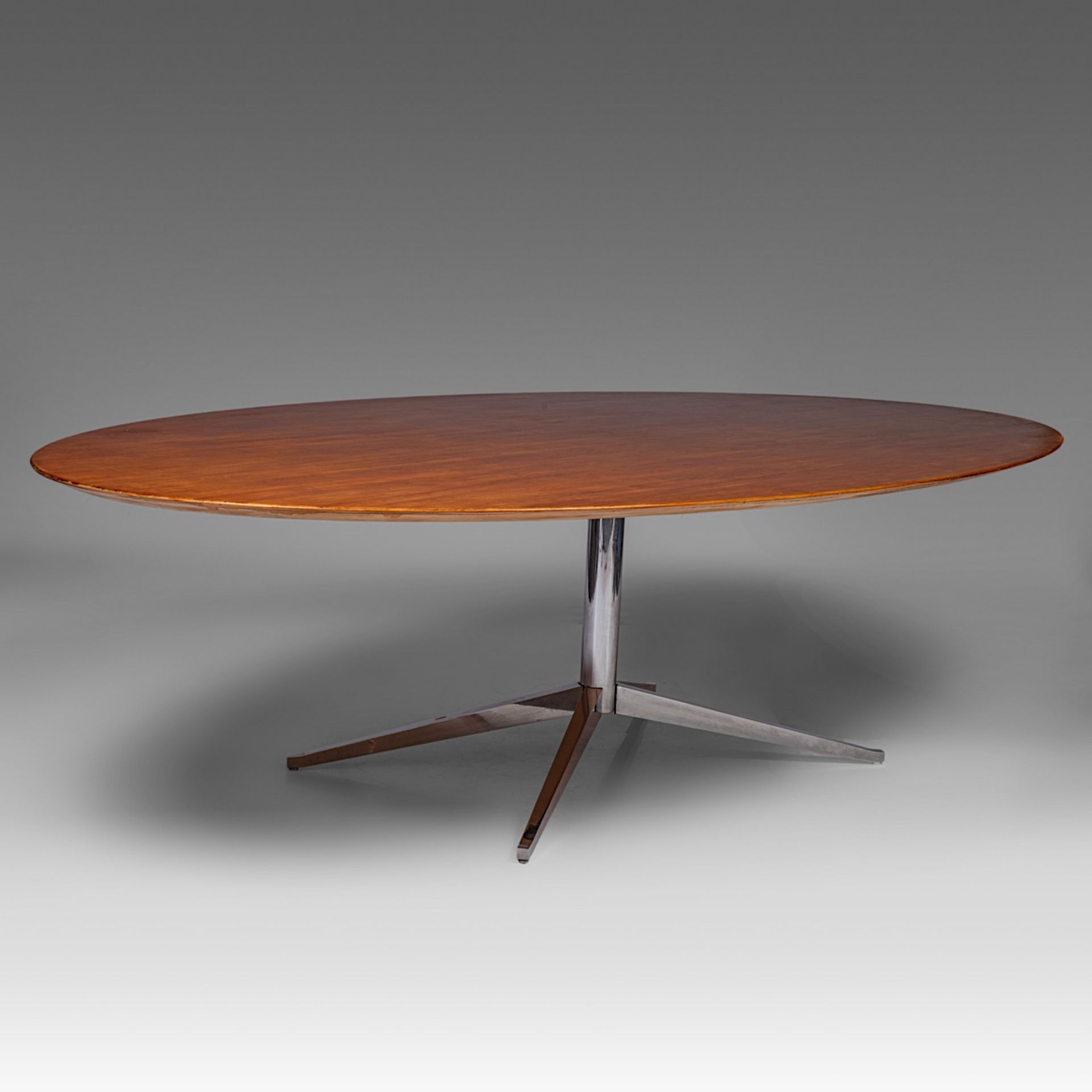 A design dining table by Florence Knoll, walnut table top on a chromed metal frame, H 72 - W 200 - D