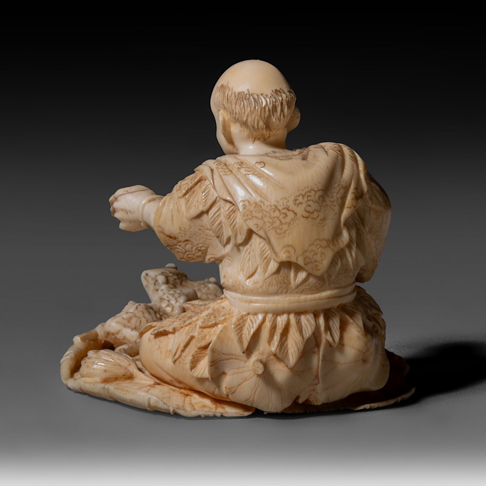 Two Japanese Meiji-period (1868-1912) ivory okimono; one depicts a man rowing a raft while a child s - Image 15 of 19