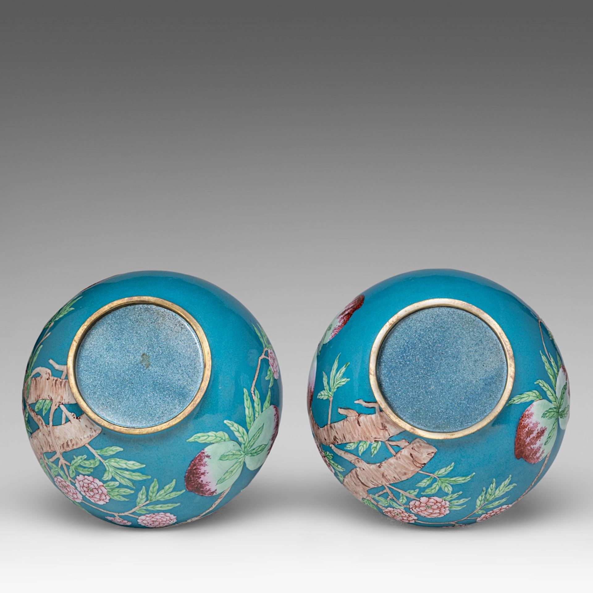 A fine pair of Chinese turquoise ground Canton enamel on copper 'Nine Peaches' bottle vases, late Qi - Image 6 of 6