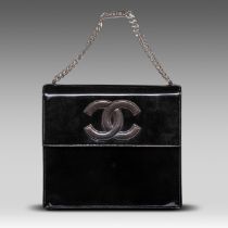 A Chanel flap handbag in black patent leather, H 22 - W 25 - D 8 cm