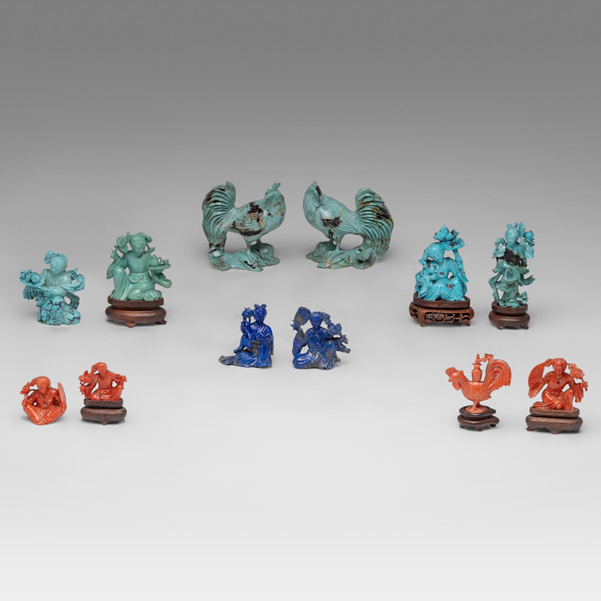 A small collection of Chinese turquoise, lapis lazuli, and red coral carvings, late Qing (late 19thC