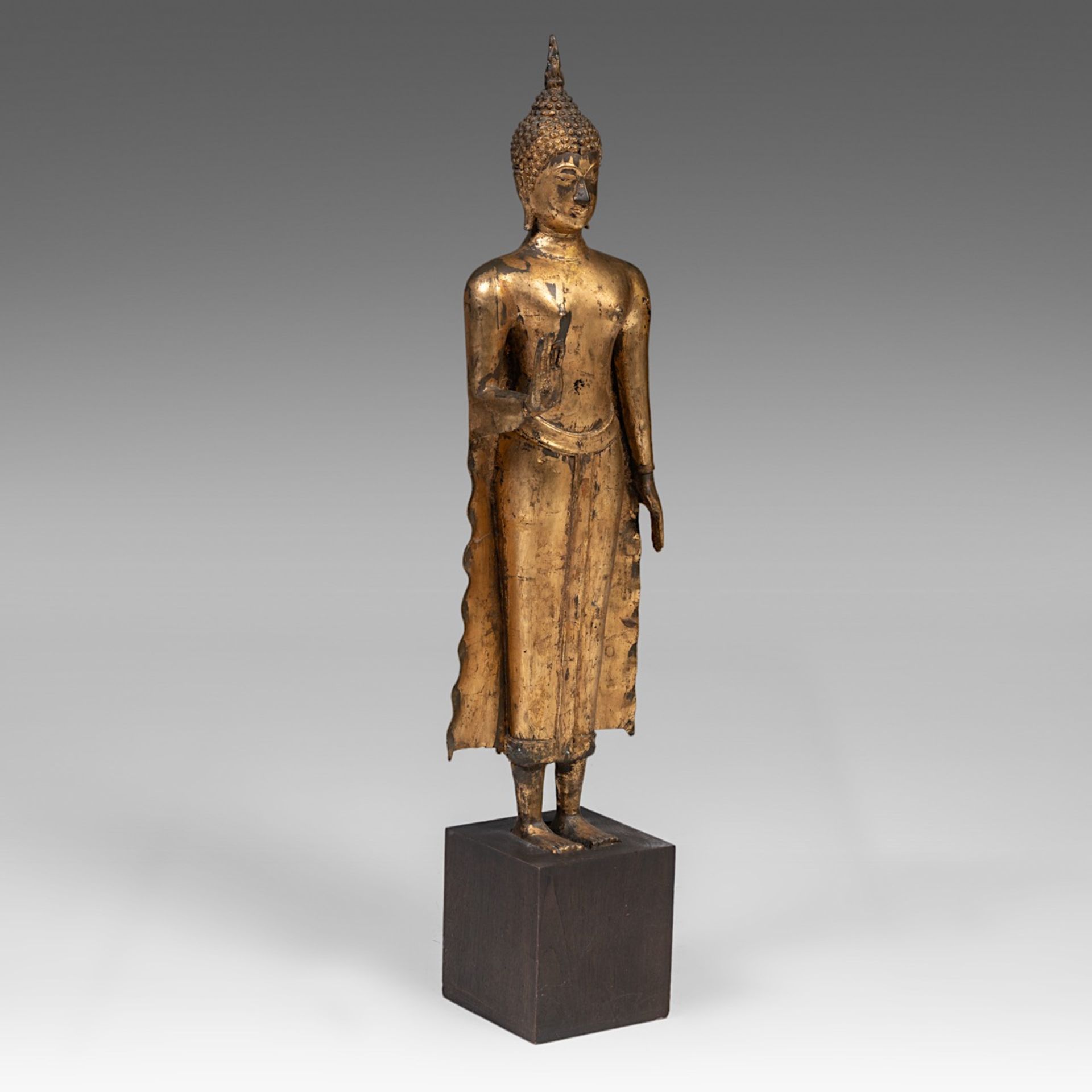 A Thai Rattanakosin style gilt bronze standing Buddha, 19thC/20thC, Total H 118 cm (incl. base)