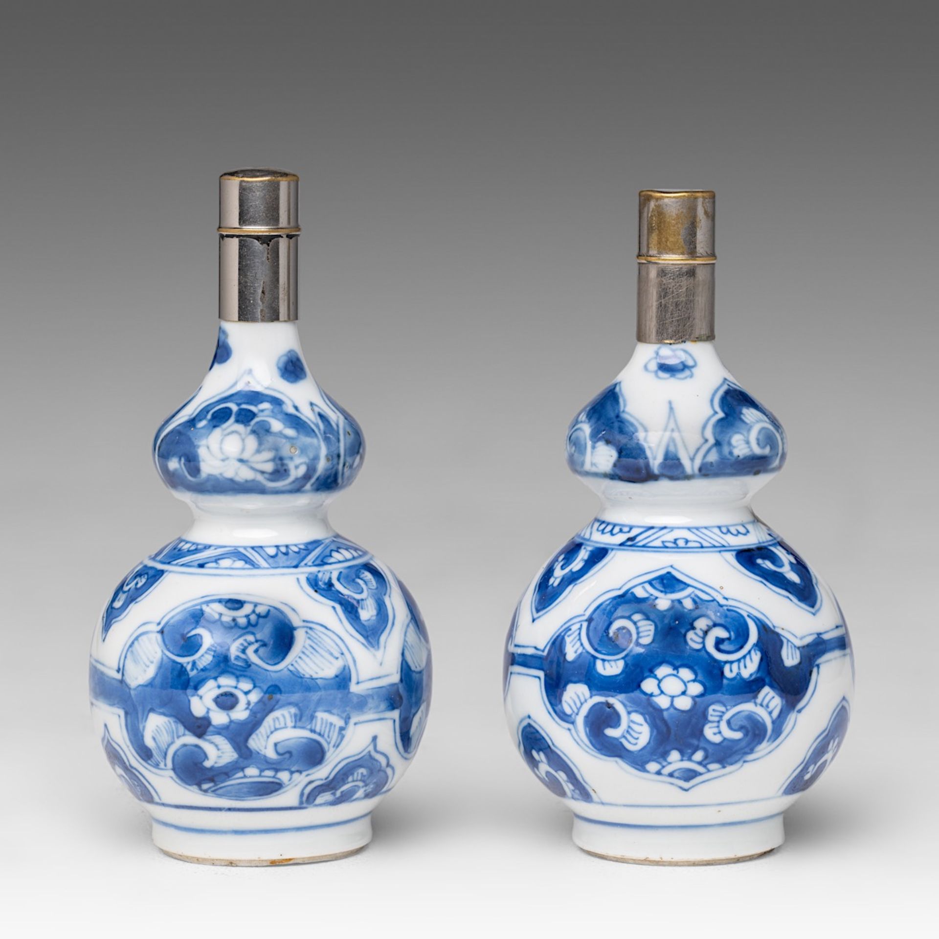 Two Chinese blue and white floral decorated double gourd vases, Kangxi period, H 13 cm - Image 3 of 6