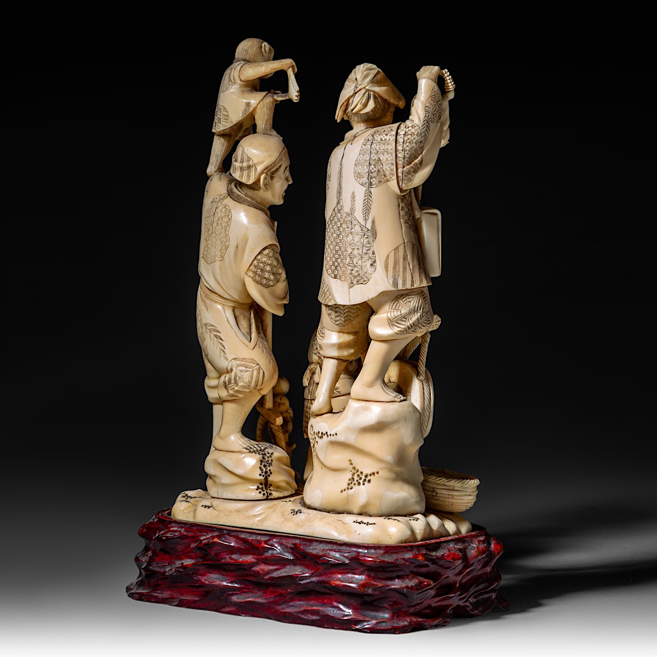 A large Japanese walrus ivory okimono of a musical family, Meiji period (1868-1912), H 26 cm - 1906g - Image 5 of 12