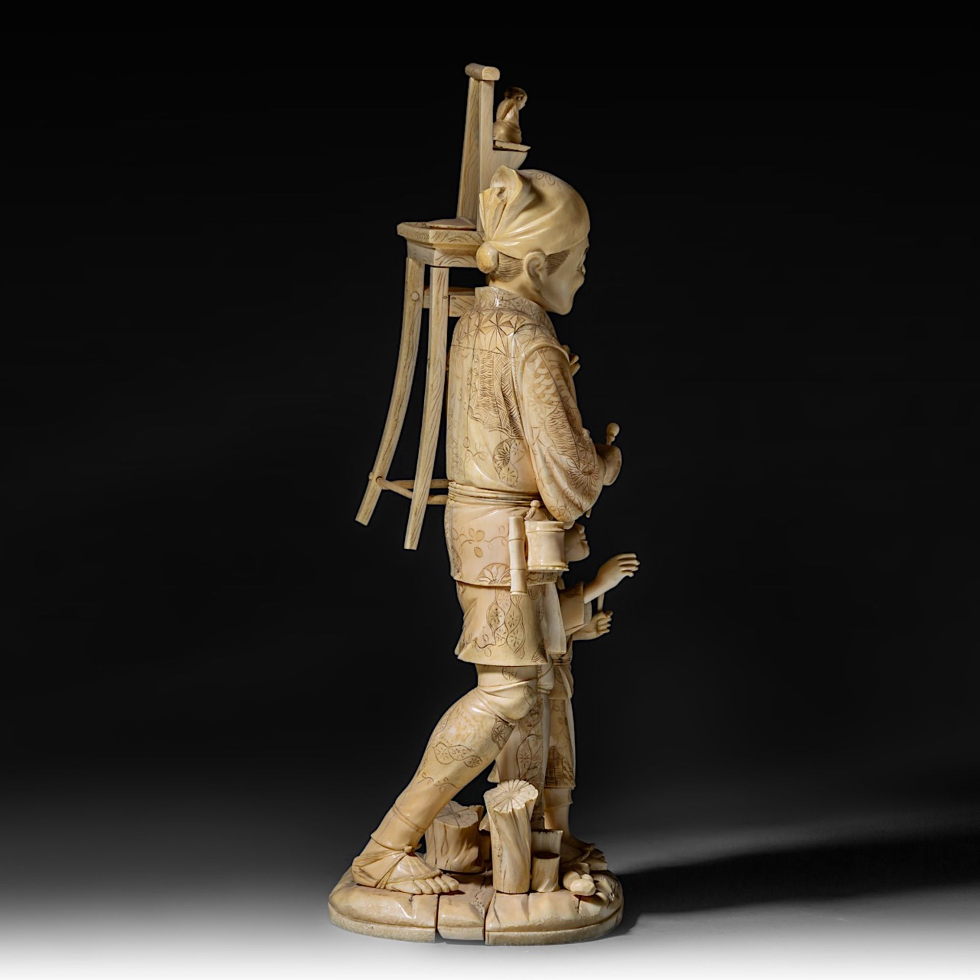 A large Japanese walrus ivory okimono of an artisan with his son, Meiji period (1868-1912), H 46,5 - - Image 7 of 13