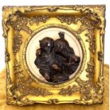 2 Bronze angels on marmory plate Framed in a Gold frame