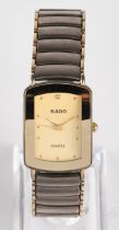 Rado, Switzerland, ceramic case and bracelet, partly gold-plated, gold dial with dot indices, quart
