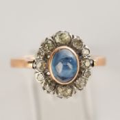 Ring, 1920er Jahre, wohl RG/Platin, Saphircabochon ca. 0.60 ct.,12 Altschliffdiamanten, ca. 4.77 g,